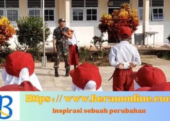 Bentuk Disiplin Generasi Muda Babinsa Koramil Talisayan Menjadi Irup di SDN 001 Suka Murya