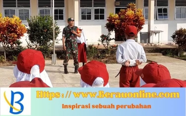 Bentuk Disiplin Generasi Muda Babinsa Koramil Talisayan Menjadi Irup di SDN 001 Suka Murya